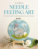 Book cover of 'Needle Felting Art' with a rabbit design on a wooden surface.