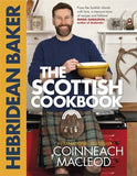 The cover of 'The Hebridean Baker: The Scottish Cookbook' featuring the author, Coinneach MacLeod, a man with a beard wearing a checkered apron, holding a bowl in a kitchen setting.